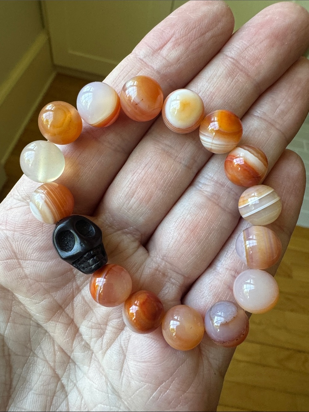 Beaded Carnelian Agate Bracelet with Black Skull Accent